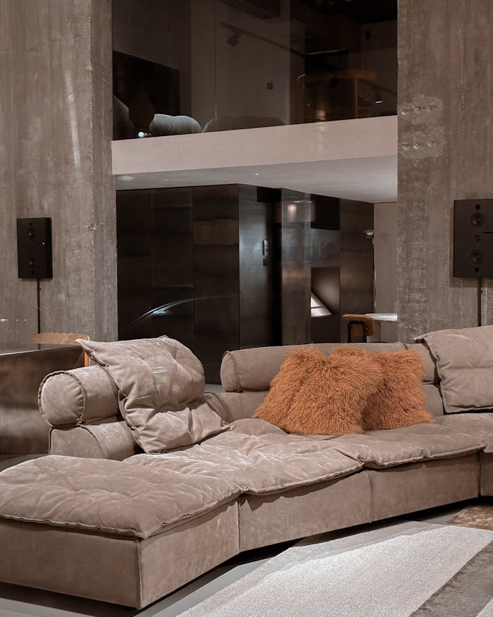 Home Stylish modern living room featuring a luxurious plush sofa and contemporary decor.